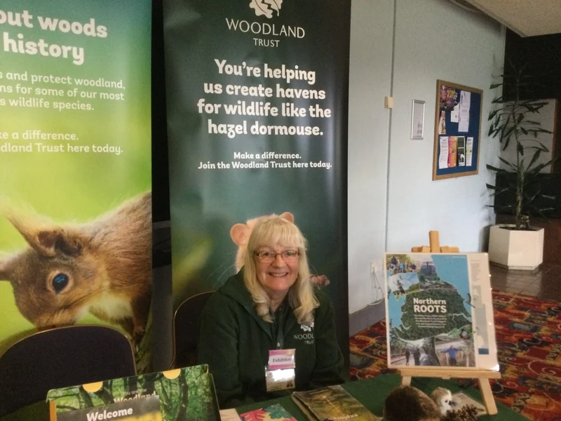An exhibitor with books and wellbeing information